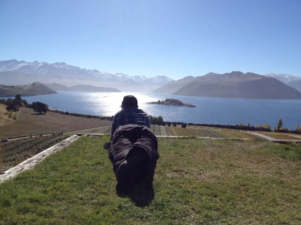 Rippon’s Nick Mills surveys his vines running down to the impossibly beautiful Lake Wanaka