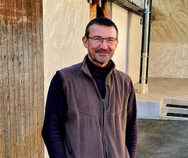 Sylvain Metrat outside his house